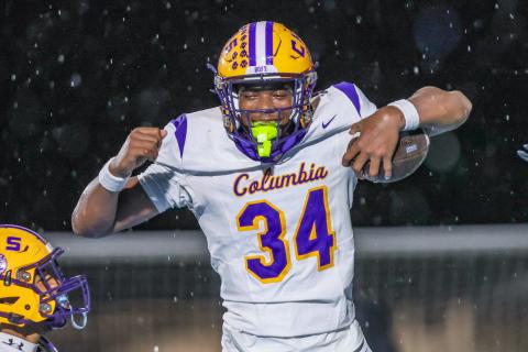 Columbia defensive end Mikel Morgan celebrates after scoring on a blocked punt against Ribault on Friday. (GARY LLOYD MCCULLOUGH/Special to the Reporter)