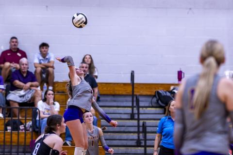 Columbia hitter Elinor Kirsch rises for a shot against Lafayette on Sept. 3. (JACK HOWDESHELL/Lake City Reporter)