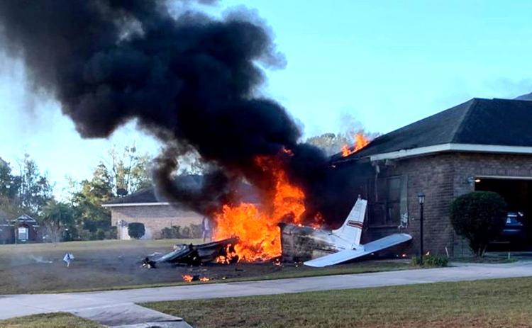 Fire engulfs the fuselage of a Piper PA32 shortly after 9:30 a.m. on Saturday on Inwood Court. The pilot, Salena Short of Tyler, Texas, perished. (AMY CREAMER BROWN/Special to the Reporter)