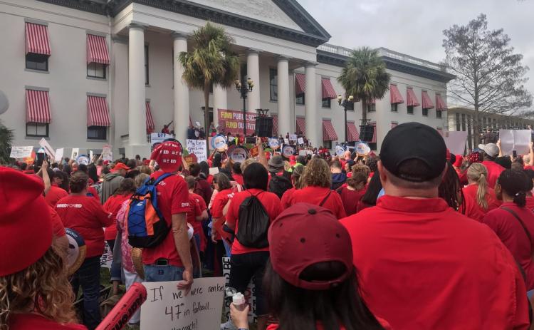 Teachers, students and concerned citizens attend the teachers rally in front of the old capitol building in Tallahassee on Monday. (COURTESY)