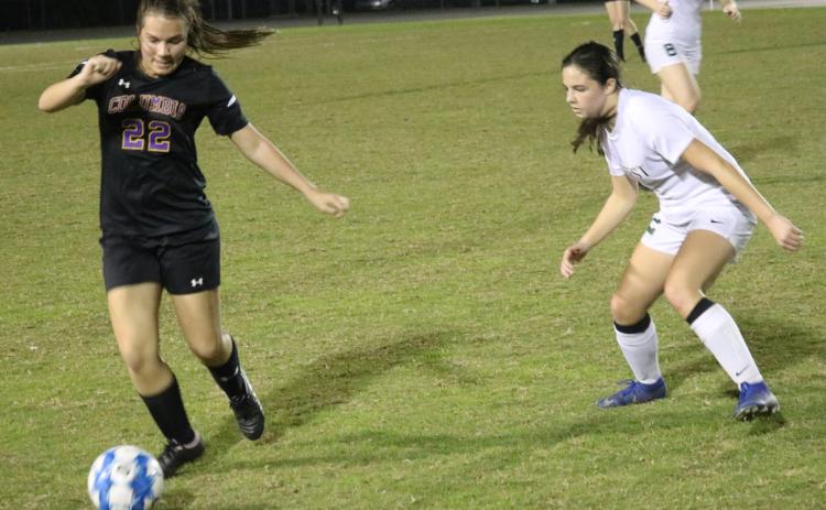 Columbia’s Hannah Dicks moves the ball up the field against Forest on Friday night. (JORDAN KROEGER/Lake City Reporter)