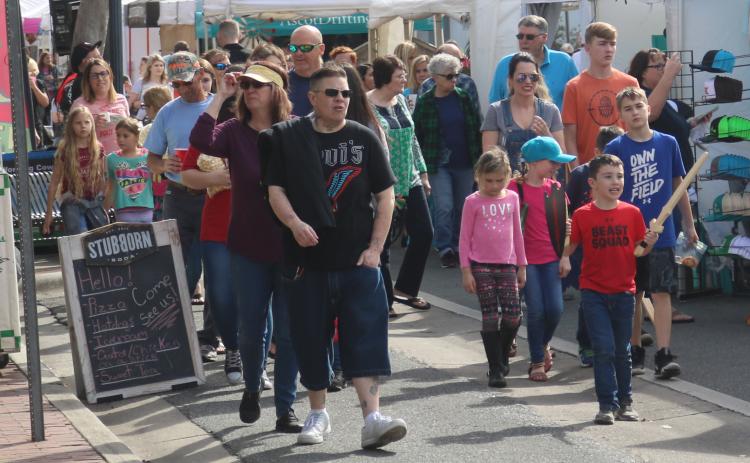 Olustee Festival-goers enjoy arts, crafts and entertainment at the annual gathering. (FILE)