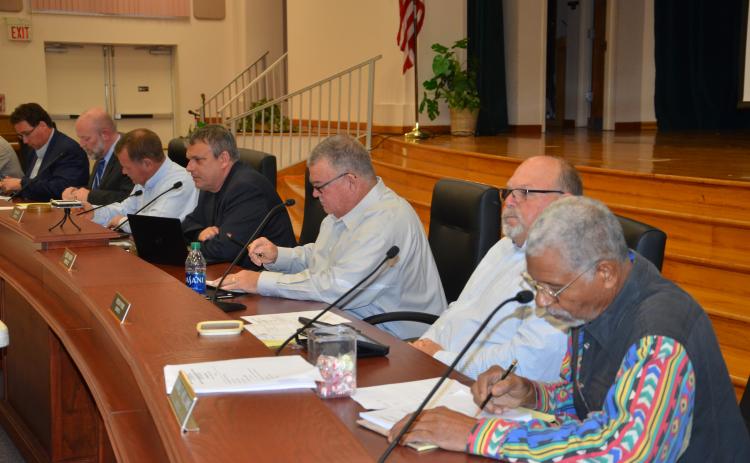 County Manager Ben Scott (from left), County Attorney Joel Foreman, and County Commissioners Tim Murphy, Toby Witt and Bucky Nash are seen during Thursday’s 4 p.m. workshop, where they discussed  developing a noise-control ordinance. Noise pollution has been at the center of numerous complaints at public meetings in recent months. (CARL MCKINNEY/Lake City Reporter)