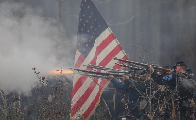 Confederate and Union re-enactors went to war Sunday at the original Olustee battlefield in Baker County. True to history and form, the South won the battle, the biggest fought in Florida during the war. (RAY CARPENTER PHOTOGRAPHY/Special to the Reporter)