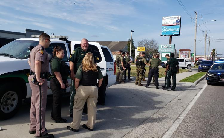 Columbia County deputies and state troopers hold their positions on U.S. Highway 90 on Tuesday. The search for Gooch took roughly two hours. (COURTESY CCSO)