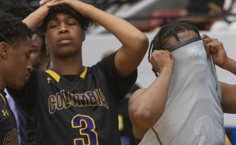 Columbia’s Charleston Ponds (3) and Darrien Jones (5), right, show their emotion after their double overtime loss to Dillard in the Class 6A semifinals at The RP Funding Center on Thursday, in Lakeland. (MICHAEL WILSON/Special to the Reporter)