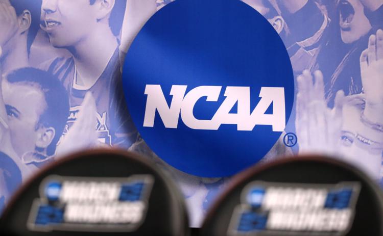 The NCAA logo is seen in the second half of the game between the Northwestern Wildcats and the Vanderbilt Commodores during the first round of the 2017 NCAA Men's Basketball Tournament at Vivint Smart Home Arena on March 16, 2017 in Salt Lake City, Utah. (CHRISTIAN PETERSEN/Getty Images/TNS)
