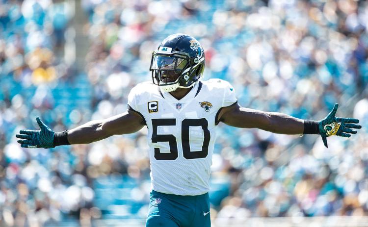 Jacksonville Jaguars linebacker Telvin Smith (50) celebrates a tackle in the second quarter versus the Tennessee Titans at TIAA Bank Field on Sept. 23, 2018, in Jacksonville. (TRIBUNE NEWS SERVICE)