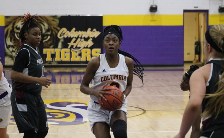 Columbia guard Na’Haviya Paxton gets set to take a shot against Madison County on Jan. 28. (FILE)