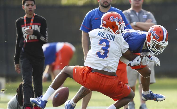 The Florida Gators will resume voluntary practices next month.(TAMPA BAY TIMES/TNS)