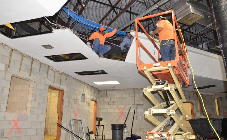 Laborers continue work on the roughly $500K CHS remodeling project, which will also include installation of new bathrooms as well as learning labs. (CARL MCKINNEY/Lake City Reporter)