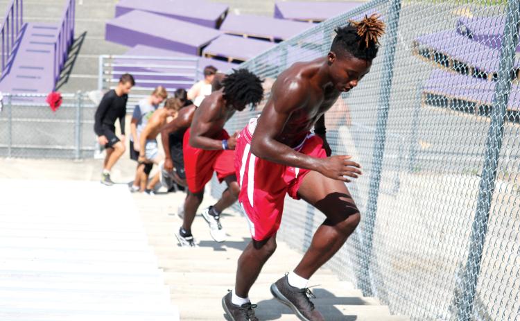 Columbia receiver Jaden Williams runs up the stadium steps during a summer workout in 2018. (FILE)