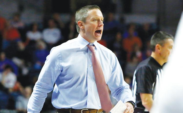 Florida coach Mike White yells to his players during a game against Mississippi on Jan. 14, in Gainesville. (AP FILE PHOTO)