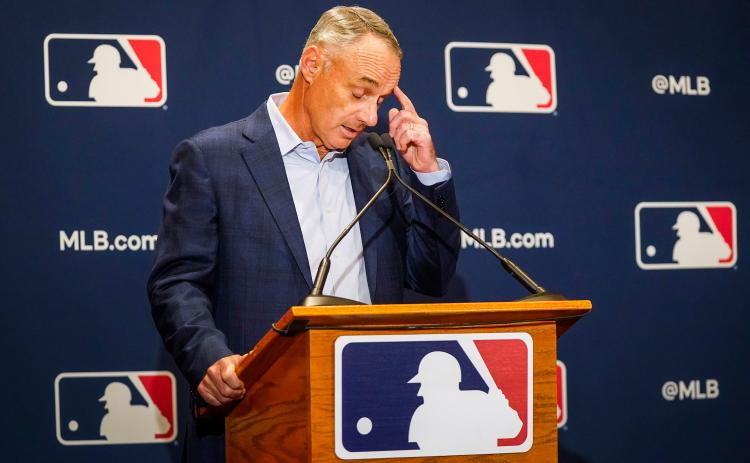 Major League Baseball commissioner Rob Manfred addresses reporters during MLB Media Day activities on Feb. 18, in Scottsdale, Ariz. (SMILEY M. POOL/TNS)