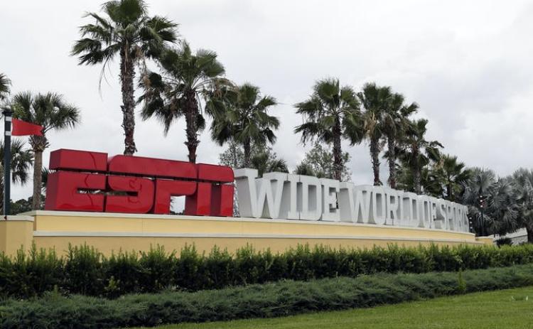 A sign marking the entrance to ESPN's Wide World of Sports at Walt Disney World is seen Wednesday, in Kissimmee. (JOHN RAOUX/AP Photo)