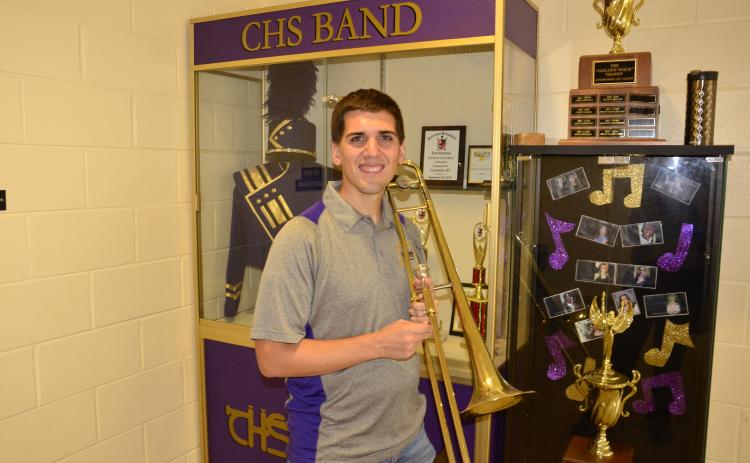 CHS band director Jay Miller is seen with his trumpet on campus. Miller was selected over countless other music educators as a quarterfinalist in the Grammy Music Educator Award for 2021. It’s a major honor that could net up to $10,000 for the school’s music program should he win. Miller credited his students with the fact that he’s made it this far. (CARL MCKINNEY/Lake City Reporter)