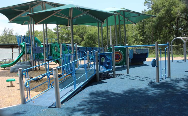 The playground at Columbia City Park is completely ADA accessible, funded in part by a state grant. (TONY BRITT/Lake City Reporter)