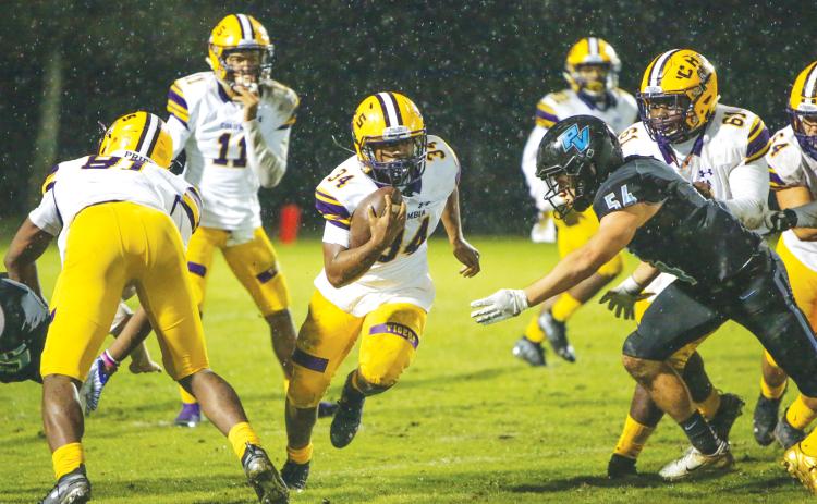 Columbia running back Tony Fulton runs up the field against Ponte Vedra in last year’s regional quarterfinals. (FILE)