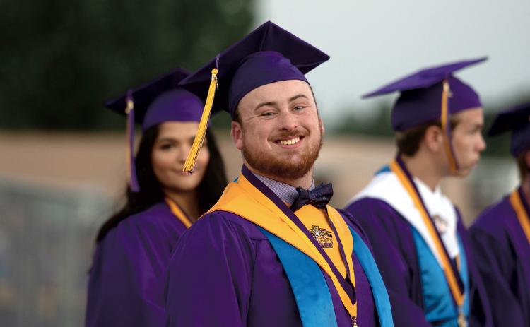 Drew Law smiles prior to Columbia’s commencement ceremony Saturday night. (RAY CARPENTER/Lake City Reporter)