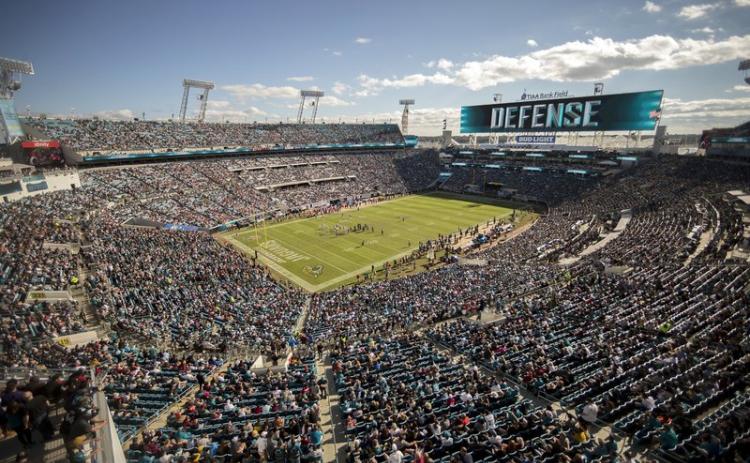 Fans watch during the first half of a game between the Jacksonville Jaguars and the Washington Redskins on Dec. 16, 2018, in Jacksonville. The Jaguars, along with Cincinnati, Miami, Tampa Bay and maybe a few others, might be best equipped to handle the NFL’s drastic change in hometown support. They’ve dealt with it for years. (AP FILE PHOTO)