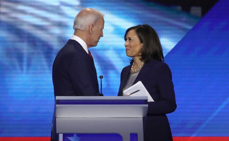 Democratic presidential candidates former Vice President Joe Biden and Sen. Kamala Harris (D-CA) speak after the Democratic Presidential Debate at Texas Southern University's Health and PE Center on Sept. 12, 2019 in Houston, Texas. (WIN MCNAMEE/Getty Images/TNS)