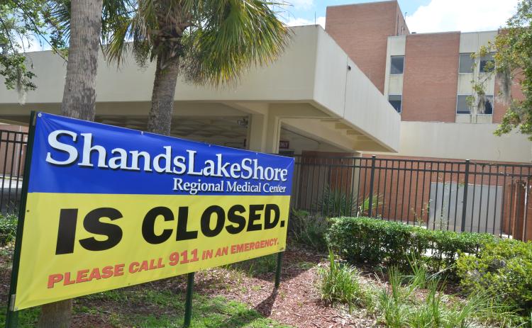 A sign outside Shands Lake Shore Regional Medical Center shows that the hospital is closed after services were stopped Aug. 28. The Hospital Authority is now vetting proposals from companies interested in providing health care at the facility. (CARL MCKINNEY/Lake City Reporter)