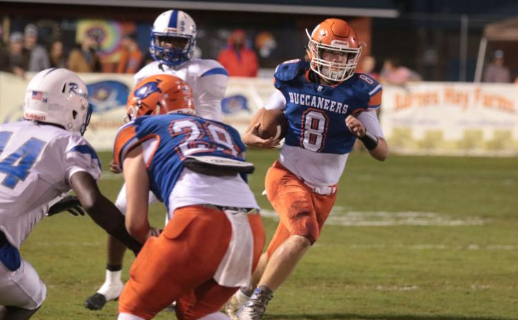 Branford quarterback Seth Heiderman, shown running against Interlachen last year, enjoyed a big opening week of distributing the ball to a handful of playmakers. (SUWANNEE DEMOCRAT)