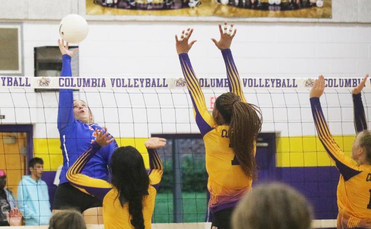 Branford’s Cera McElreath sends a shot over the net against Columbia on Monday night. (JORDAN KROEGER/Lake City Reporter)