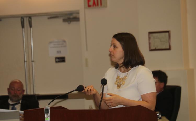 Jamie Bell, public engineer with Jones Edmunds and Associates, presents the preliminary engineering report and the first phase of the wastewater treatment facility to the County Commission on Thursday. (TONY BRITT/Lake City Reporter)