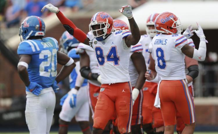 Florida receiver Kyle Pitts celebrates his fourth touchdown of the day on Saturday, in Oxford, Miss. (THOMAS WELLS/The Northeast Mississippi Daily Journal via AP)
