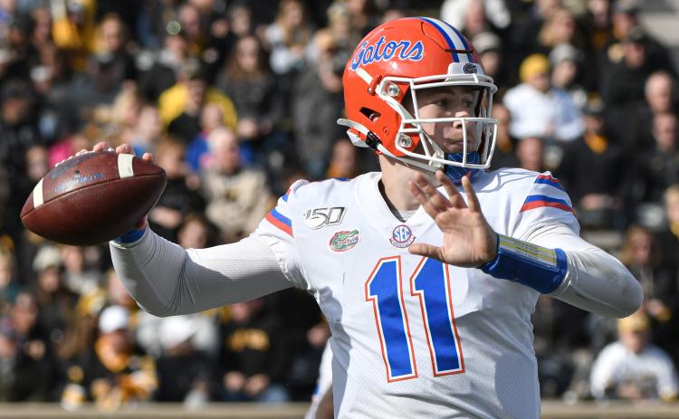 Florida Gators quarterback Kyle Trask passes against the Missouri Tigers at Faurot Field/Memorial Stadium on Nov. 16, 2019, in Columbia, Missouri. (ED ZURGA/Getty Images/TNS)