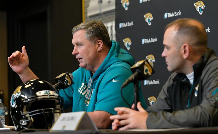 Jaguars head coach Doug Marrone (left) and general manager Dave Caldwell talk about next season during a press conference on Dec. 31, 2019 at TIAA Bank Field in Jacksonville. (WILL DICKEY/TNS)