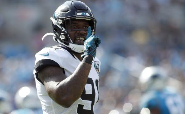 Then-Jacksonville Jaguars defensive end Yannick Ngakoue (91) reacts following a play against the Carolina Panthers during the first half of a game on Oct. 6, 2019, in Charlotte, N.C. (AP FILE PHOTO)