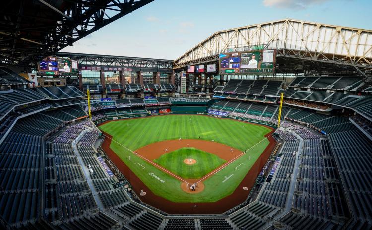 The Texas Rangers face the Oakland Athletics with the roof open during the first inning of game two of a double header at Globe Life Field on Saturday, in Arlington Tex. (SMILEY N. POOL/The Dallas Morning News/TNS)