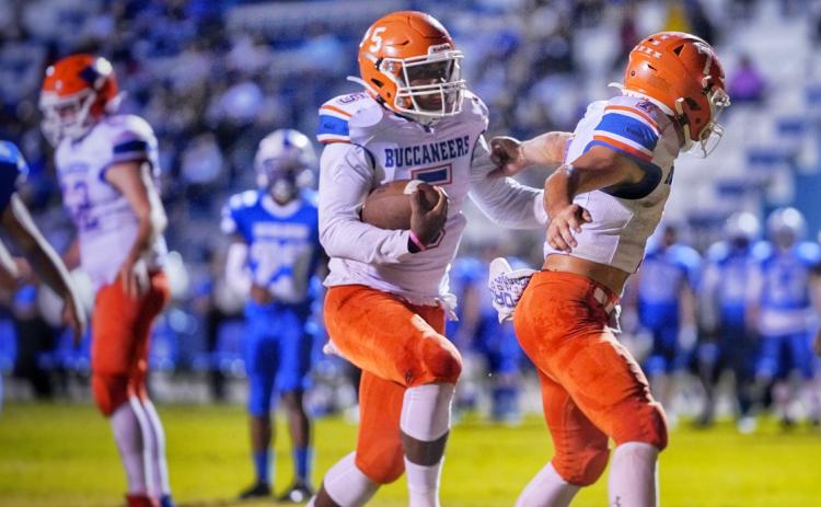Markell Pugh takes a carry up the field against Interlachen last Friday. (BRIAN LEWIS/Special to the Reporter)
