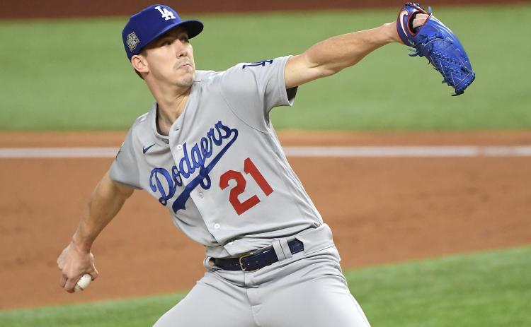 Los Angeles starter Walker Buehler pitches against Tampa Bay in the third game of the World Series on Friday night in Arlington, Texas. (WALLY SKALIJ/Los Angeles Times/TNS)