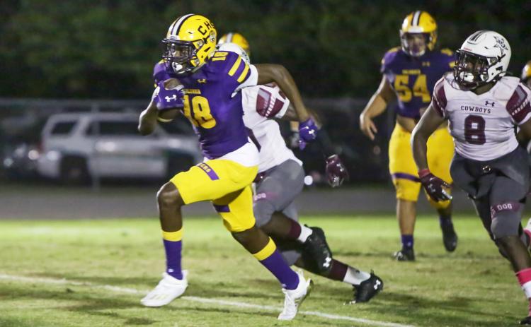 Columbia’s Marcus Peterson picks up a first down on a fake punt last week against Madison County. (BRENT KUYKENDALL/Lake City Reporter)