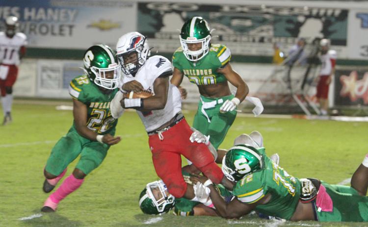 Suwannees defense converges for a tackle against Wakulla last Friday. (PAUL BUCHANAN/Special to the Reporter)