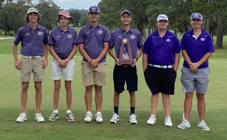 Columbia’s boys golf team won its second straight District 2-2A title on Monday. Pictured with the trophy are Zach Shaw (from left), Spencer McCranie, Ty Folsom, coach Chase Hagler, Connor Williams and Josef Walker. (COURTESY)