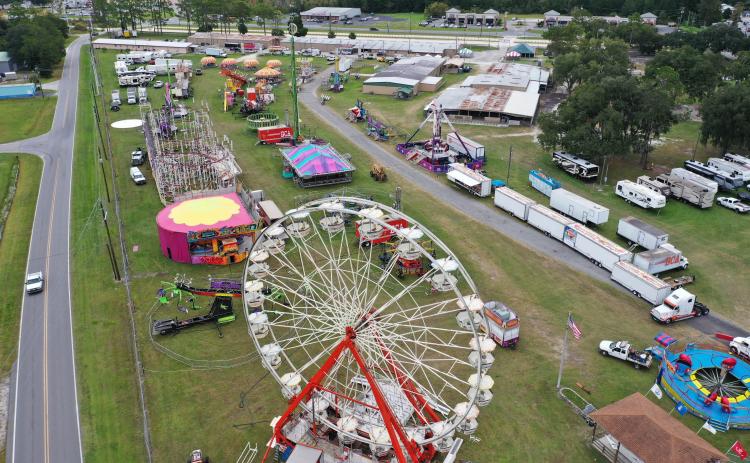 Rides on the midway at the Florida Gateway Fairgrounds were set up and assembled Tuesday prior to this weekend’s start of the 66th annual Florida Gateway Fair. (RAY CARPENTER PHOTOGRAPHY)