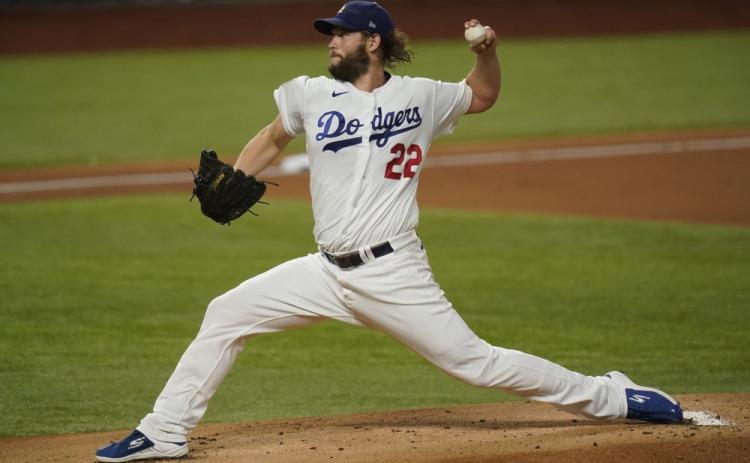 Los Angeles Dodgers starting pitcher Clayton Kershaw throws against the Tampa Bay Rays during the first inning in Game 1 of the World Series on Tuesday in Arlington, Texas. (ERIC GAY/Associated Press)