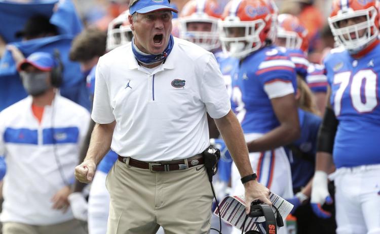 Florida head coach Dan Mullen yells to a referee about a call during a game against South Carolina on Oct. 3 in Gainesville. (AP POOL FILE PHOTO)