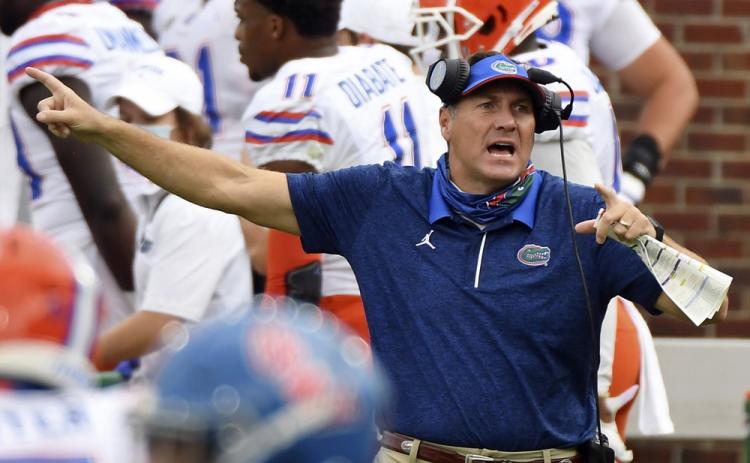 Florida head coach Dan Mullen reacts during the second half of a game against Mississippi on Sept. 26 in Oxford, Miss. No. 10 Florida resumed meetings and practices for the first time in two weeks Monday. They got back to work after a covid-19 outbreak caused the Southeastern Conference to postpone two of the team’s games. (AP FILE PHOTO)