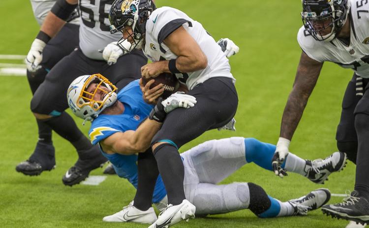Chargers defensive end Joey Bosa assists in sacking Jaguars quarterback Gardner Minshew II on Oct. 25 in Inglewood, CA. Chargers beat the Jaguars 39-29. (ALLEN J. SCHABEN/Los Angeles Times/TNS)