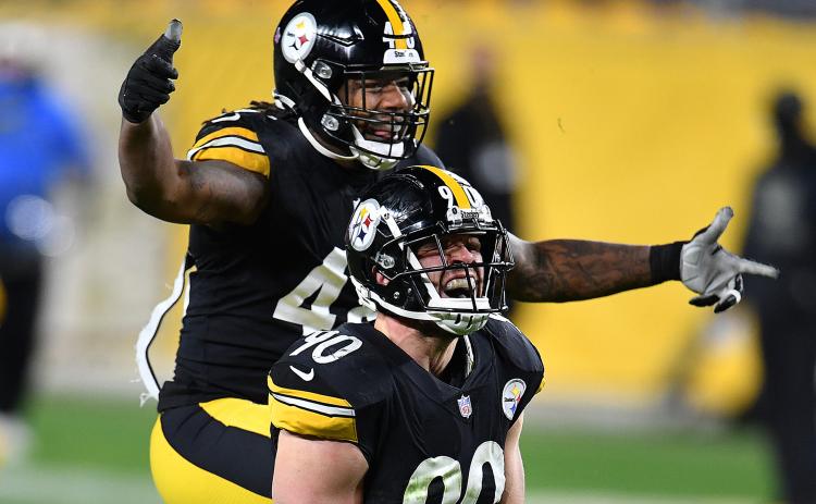 Pittsburgh Steelers linebackers T.J. Watt and Bud Dupree celebrate after sacking Cincinnati Bengals quarterback Joe Burrow on Nov. 15 at Heinz Field in Pittsburgh, Pennsylvania. (PETER DIANA Diana/Pittsburgh Post-Gazette/TNS)
