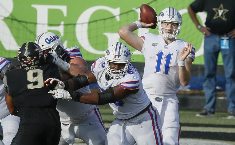 Florida Gators quarterback Kyle Trask throws a pass against the Vanderbilt Commodores last Saturday in Nashville, Tennessee. Florida won, 38-17. (FREDERICK BREEDON/Getty Images/TNS)