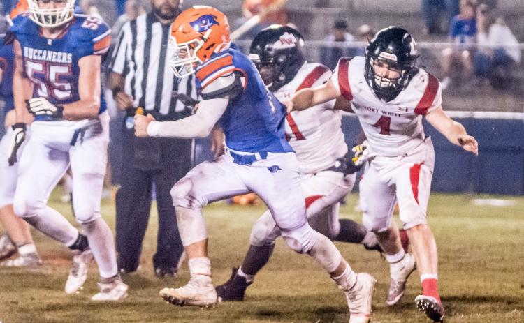 Fort White linebacker Colby Holton goes in for a tackle against Branford in last Friday’s Region 3-1A quarterfinal. (CHRISTINA FEAGIN/Special to the LCR)