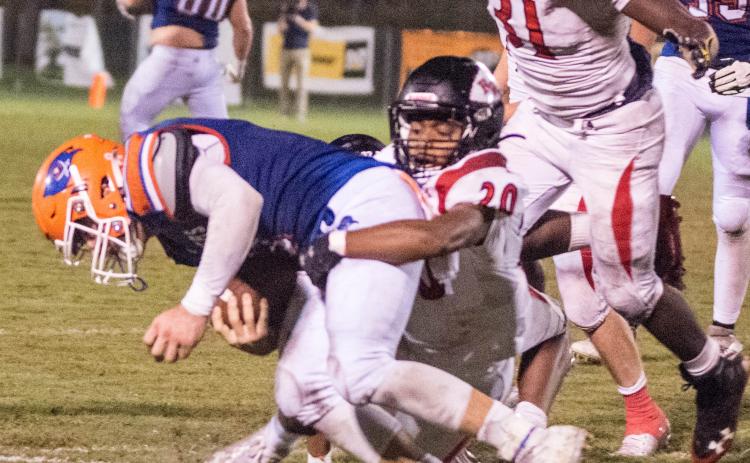 Fort White’s Diontay Haughten makes a tackle against Branford during Friday’s Region 3-1A quarterfinals. (CHRISTINA FEAGIN/Special to the Reporter)