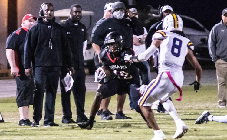 Fort White receiver Najeeb Smith runs up the field after a catch against Union County during Friday’s Region 3-1A semifinal. (CHRISTINA FEAGIN/Special to the Reporter)