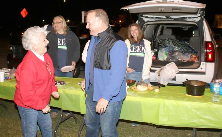 Kyle Keen (right) celebrates with a supporter after he was elected the Columbia County Tax Collector during Tuesday’s election. (TONY BRITT/Lake City Reporter)
